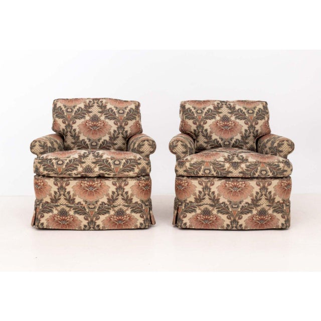 Pair of Floral Print Fabric Upholstered Easy Arm Chairs. 30" H x 32.5" W x 34" D; seat: 18" H. Provenance: The Estate of...