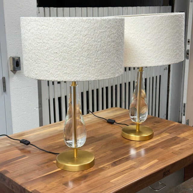 Design Plus Gallery presents a pair of Stilla Table Lamps by Eichholtz. Each lamp showcases a sculptural teardrop-shaped...