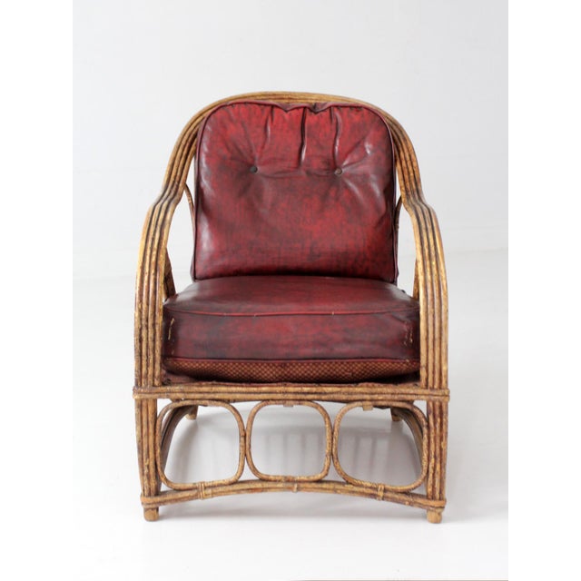 This antique rattan lounge chair, dating to the 1930s–1940s, features a beautifully aged bundled frame, sweeping rounded...