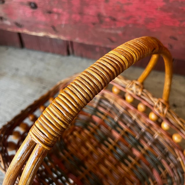 This vintage wicker gathering basket, with warm tones and intricate weaving, exudes rustic charm. Ideal for display or...
