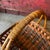 This vintage wicker gathering basket, with warm tones and intricate weaving, exudes rustic charm. Ideal for display or...