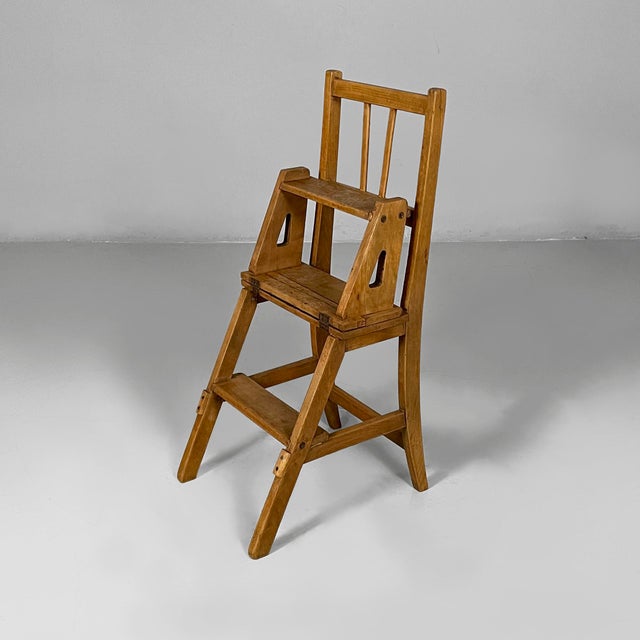 Italian mid-century modern chair ladder in wood, 1930s Chair converts into a ladder, made entirely of wood. The...
