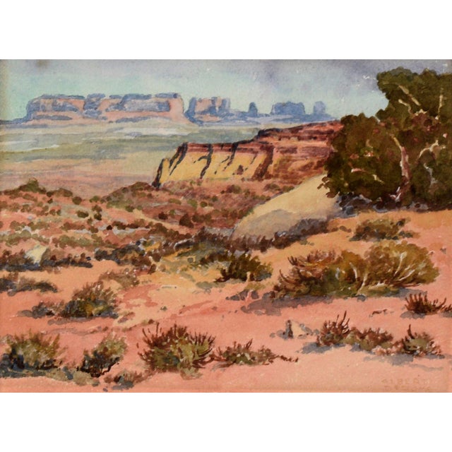 Detailed watercolor of Monument Valley by Albert DeRome (American, 1885-1959). The viewer is looking out over the valley...