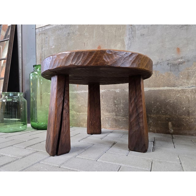 This neat and sturdy round table is made during the 1970s of solid European oak. The design is simple and elegant, with a...