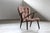 This lounge chair, a rare example of vintage Danish design, embodies the timeless elegance and functional comfort that...