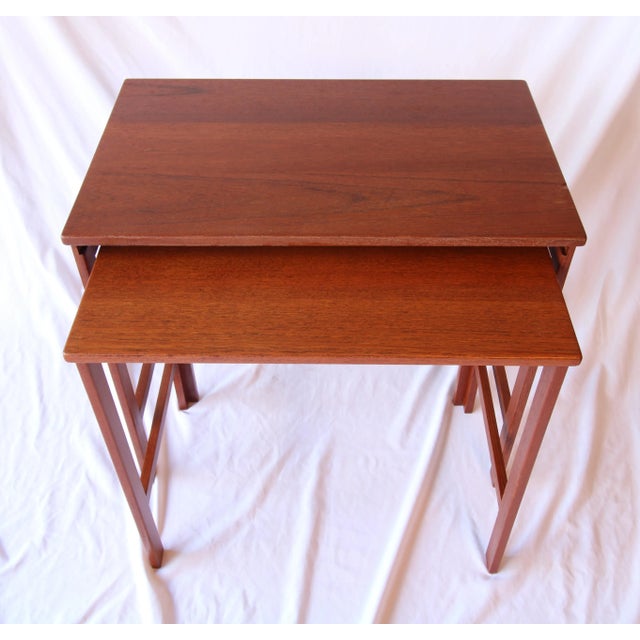 This Charming Set of Two (2) Mid Century Danish Modern Nesting Tables were designed by Peter Hvidt for France and...