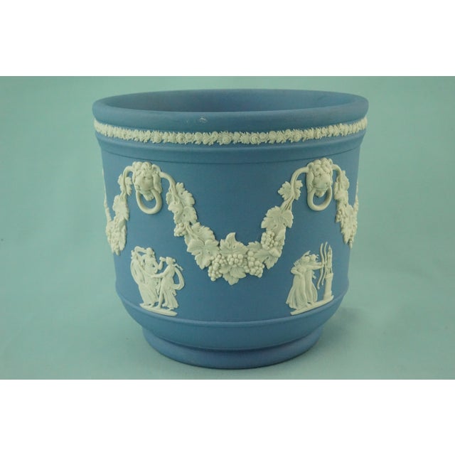 Item description: Delightful flared cachepot, centerpiece in blue Jasperware with bas-relief decorations in white...