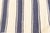Vintage Indian Dhurrie Striped rug Size: 3'6" × 6'5" (106 × 195 cm) This vintage Indian Dhurrie rug presents a timeless...