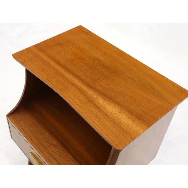 Pair of light walnut Mid-Century Modern nightstands or side tables.