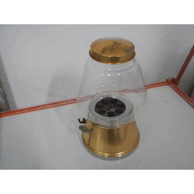 Used in shops for candy distribution.