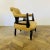 A Well Proportioned, Low Armchair, Circa 1900s. The armchair features a lovely scrolled back with detailed work and It...