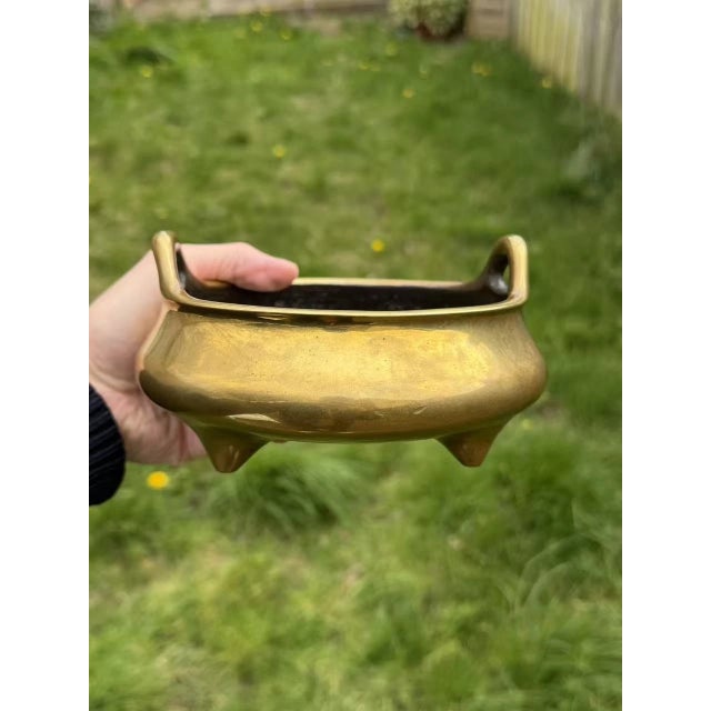 A remarkably fine and heavy Chinese bronze censer (incense burner) dating back to the 17th century during the Qing...