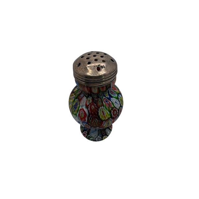 A vintage Murano glass millefiori muffineer or sugar shaker by Fratelli Tosso, ca. 1930’s. It has a multi-colored...