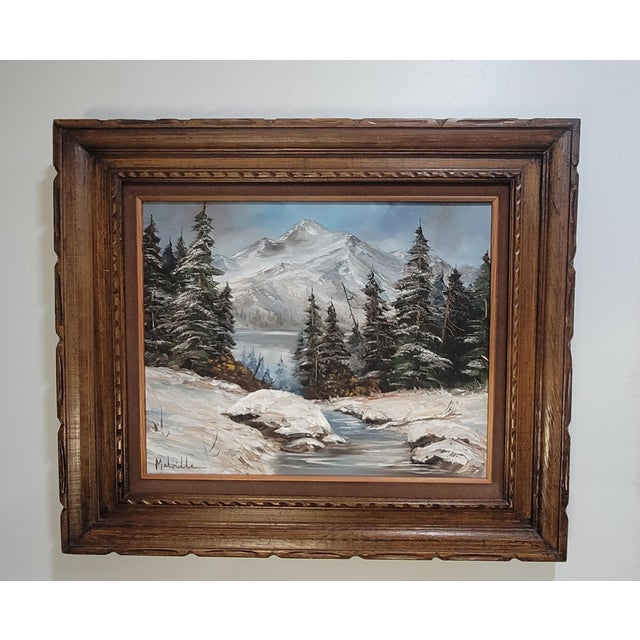 The product is a medium-sized framed oil painting on canvas depicting Forest & Snow Capped Mountains by Melville. It...