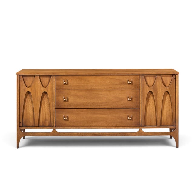 Broyhill Brasilia Mid Century Walnut and Brass 66 Inch Credenza This credenza measures: 66 wide x 19 deep x 31 inches high...
