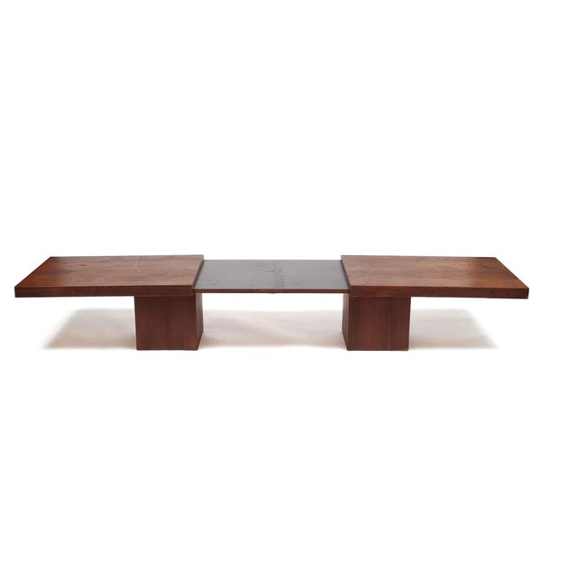 A beautifully designed expanding coffee table by John Keal for Brown Saltman, mid-20th century. This classic MCM piece...