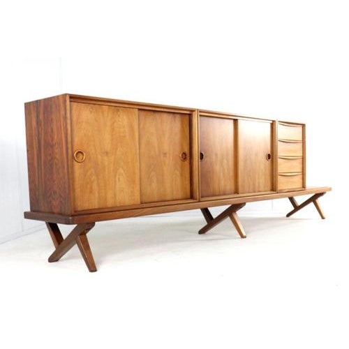 Discover this masterpiece of dutch craftsmanship from the 1950s, crafted by the renowned fristho franeker furniture...
