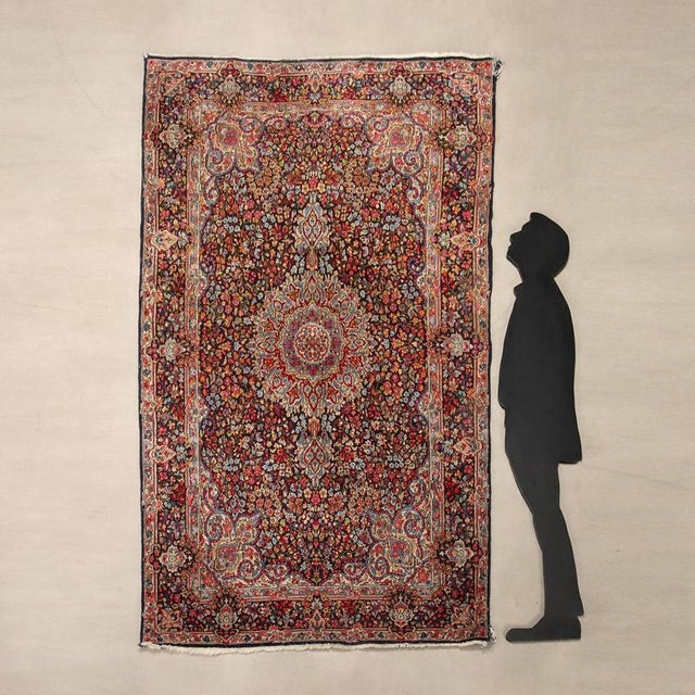 Kerman rug in cotton and wool, large knot and hand-made. This piece is attributed to the mentioned designer/maker. It has...