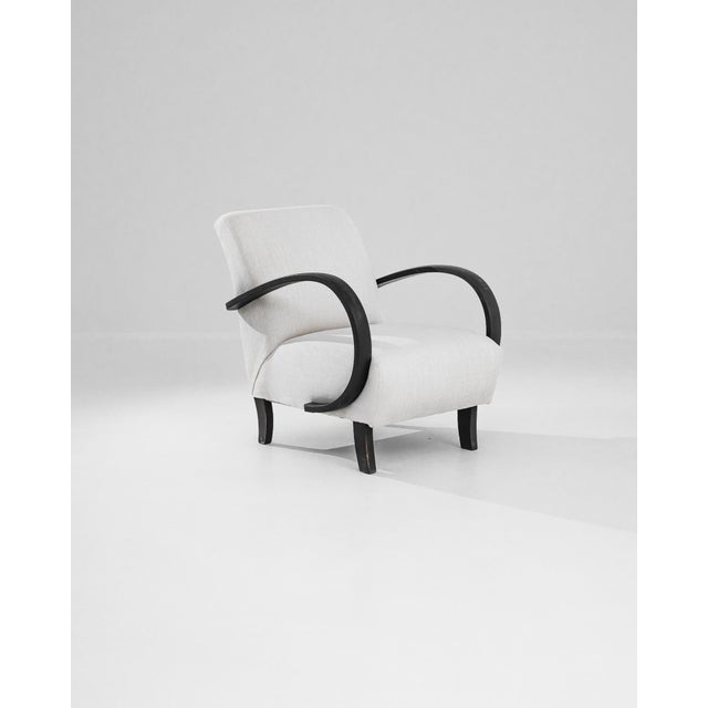 Add a touch of Art Deco elegance to your home with this stunning 1930s Czech Wooden Armchair by J. Halabala. Renowned for...