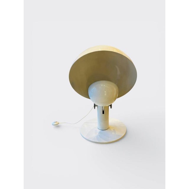 Cuffia table lamp designed by Francesco Buzzi for Bieffeplast Model Cuffia. This postmodern lamp is made out of a white...