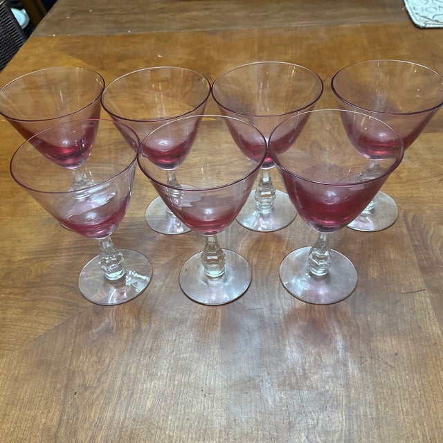 Large Set of Tiffin Wisteria Goblets: 7 Wine Goblets, 5 Champagne Coupes, and 7 Cordials. 19 total. These goblets were...