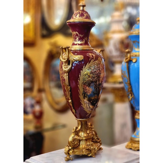 Elevate your interior with this exquisite French-style porcelain vase, a timeless decorative piece designed to bring...