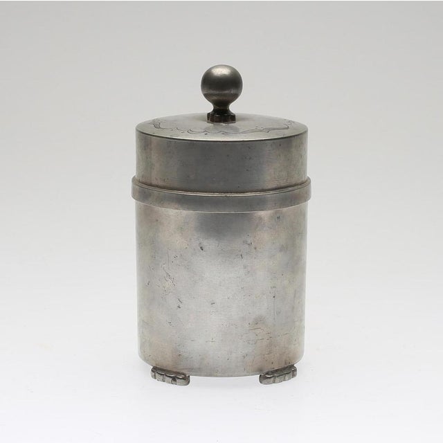 Elegant Swedish pewter lidded box produced by Bröderna Edlund Silverfabrik, dated 1936. This refined piece features a...