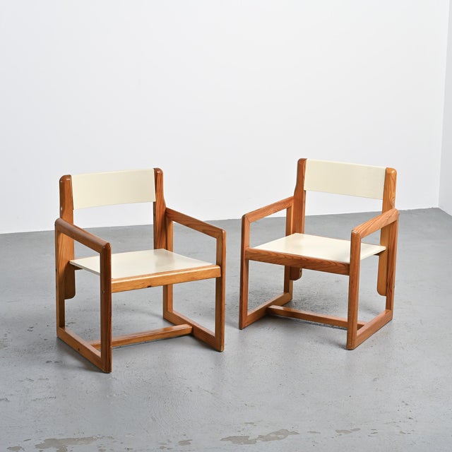 Pair of armchairs made by the Lyon-based cabinetmaker and designer André Sornay in the 1960s. The solid pine frames are...