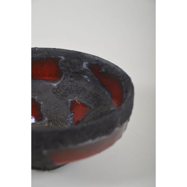 Vintage Fat Lava bowl from the 1970s made by Marei Keramik. This bowl, number 4211, is made using a specific glazing...