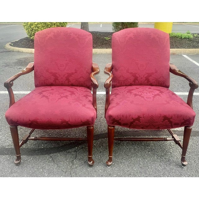 Very nice pair of vintage Georgian style Gainsborough chairs. Popular in 18th century England this style chair features a...