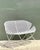An iconic example of American mid-century outdoor design, this vintage Salterini "Orange Slice" bench showcases the...