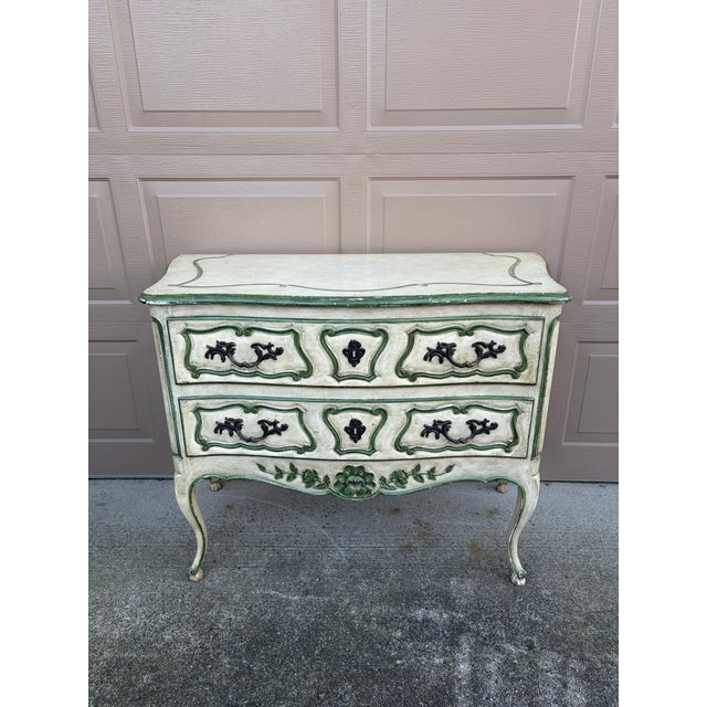 There is something particularly charming about mid-century American interpretations of French furniture, and this Bodart...
