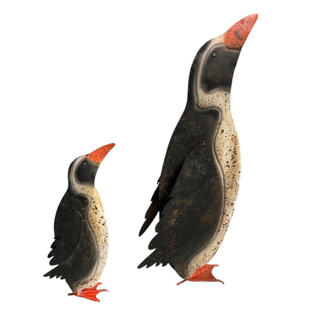 Add a touch of whimsical, rustic charm to your decor with this delightful pair of vintage-style metal penguin sculptures,...