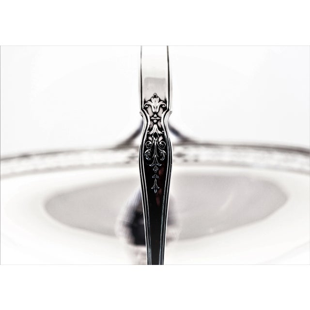 Simple and yet elegant. This basket sits on a pedestal so it’s raised off the surface. A pretty cutout motif goes around...