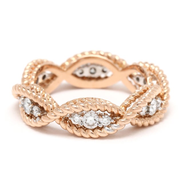 Stones: diamond round brilliant cut .46ctw FG color/ VS1-2 clarity ruby round Ring Size 5 Rise off of Finger: 3.3 mm...