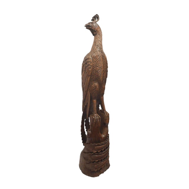 This hand-carved Phoenix sculpture is a commanding interpretation of ancient myth, carved in high relief from a single...