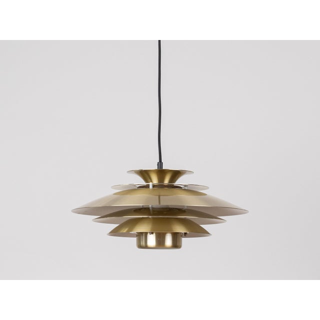 A beautiful vintage pendant lamp designed by danish designer kurt wiborg and manufactured by jeka. With its timeless form...