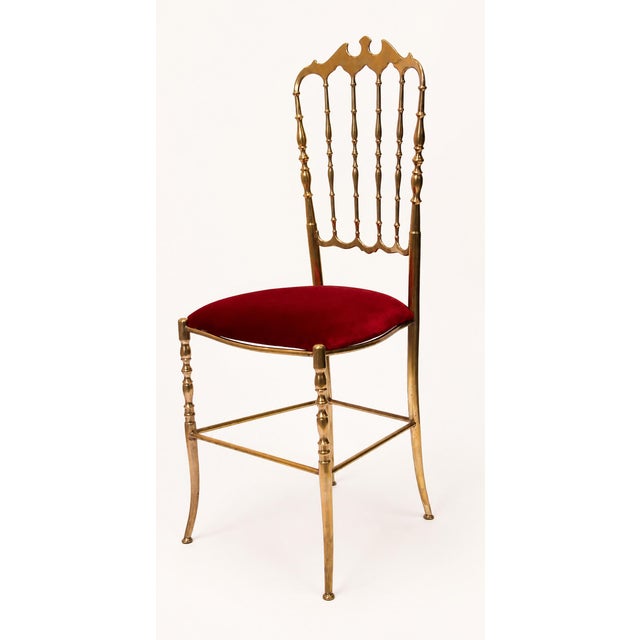 More jewel-like than conventional occasional seating, this vintage Italian Chiavari chair combines a tall, finely...