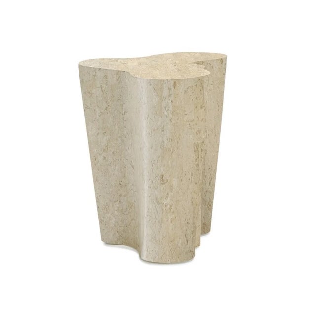 Veneered in genuine fossil stone, the Natura occasional table by Oggetti showcases an undulating, award-winning silhouette...
