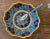 This colorful Collectible Majolica Scallop Bowl in the B-64 Pattern can be used for food or decoration. The piece was...