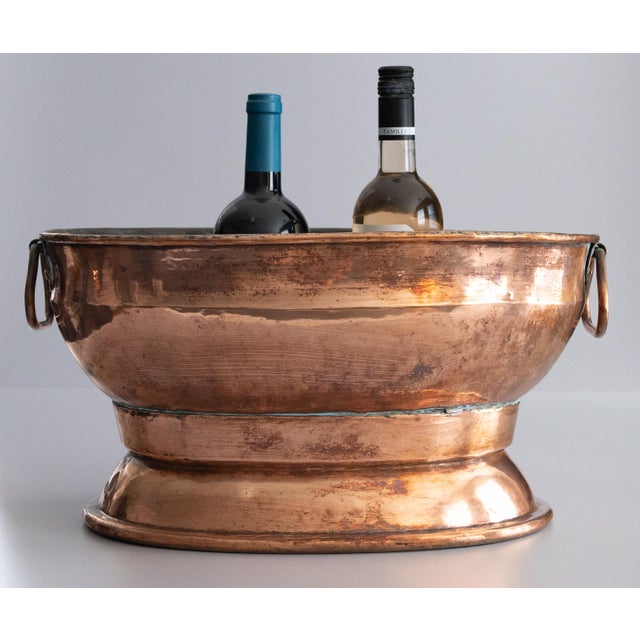 A superb large 18th Century French copper oval wine cooler or champagne ice bucket, also known as a rafraîchissoir. This...