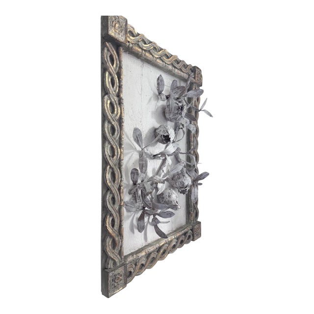 The Ancient Harvest: Paper Mache pomegranate branch set in a partial gilt rolling coin plaster frame. The piece features a...