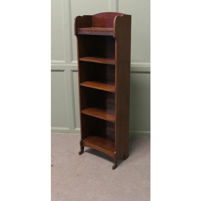 Art Deco Tall Slim Oak Bookcase. This Oak bookcase has 5 open shelves with a gallery along the back of the top shelf and a...