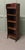 Art Deco Tall Slim Oak Bookcase. This Oak bookcase has 5 open shelves with a gallery along the back of the top shelf and a...
