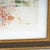 Bruno Saetti print with a golden frame, featuring a stylized landscape.