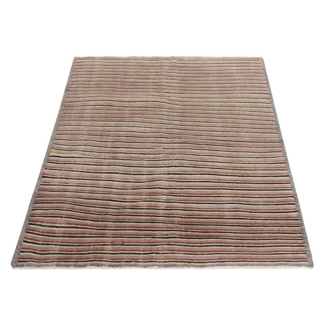 Hand-knotted in wool, a 5x7 vintage rug from a venerated multidisciplinary Turkish designer, commemorated in Rug & Kilim’s...