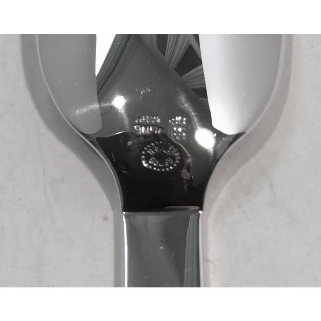 Sterling silver marrow scoop in the "Pyramid" pattern by Georg Jensen and bearing the preferred Denmark hallmark incised...