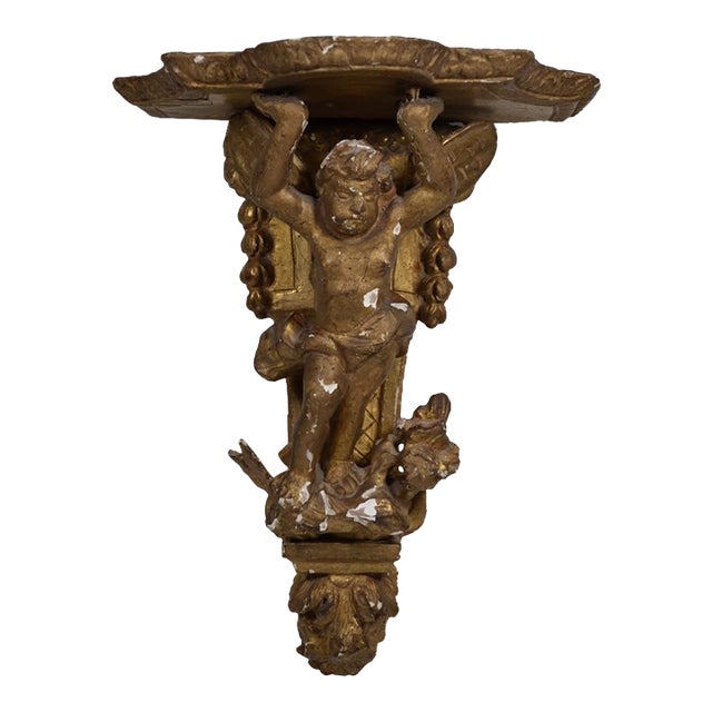 France XVIIIth Century Small Wall Bracket in Stuccoed and Gilded Wood, the Scalloped Top Supported by Zéphir For Sale
