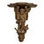 France XVIIIth Century Small Wall Bracket in Stuccoed and Gilded Wood, the Scalloped Top Supported by Zéphir For Sale