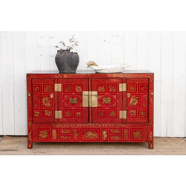 This captivating sideboard isn't just a piece of furniture; it's a window into the rich cultural heritage of Dongbei,...